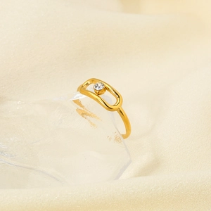 18K gold plated stainless steel ring featuring a hollow oval frame and center zircon