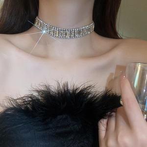 Sparkling crystal choker necklace with multi-row starburst effect on elegant silver metal