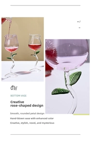 Macro detail of hand-blown rose wine glass with green leaf accents and petal texture