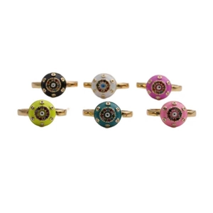 Detail view of colorful evil eye rings with vibrant enamel colors and gold plating