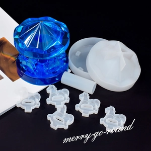 DIY Carousel Silicone Mold Set with finished blue resin merry-go-round model on black background