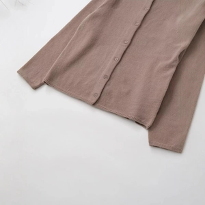 Minimalist long sleeve turtleneck knit cardigan in earth tone with front buttons