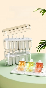 Macro view of a 10-cavity stackable popsicle mold with lids and tray for home freezing