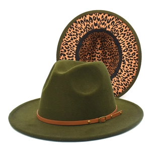 Detail of dark green jazz hat featuring leopard print lining and brown leather belt
