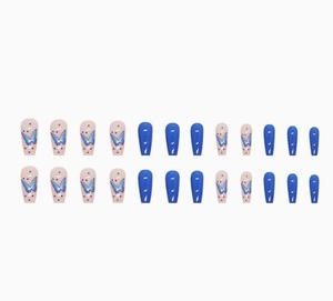 Detail of 24pcs blue butterfly and polka dot patterns on long ballerina press-on nails