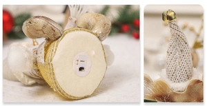 Detail view of the battery compartment and golden bell on the knitted Christmas doll