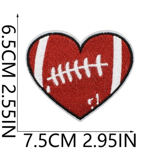 Detail of red heart-shaped football embroidery patch with precise dimension markings
