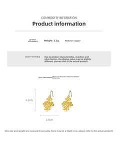 Detail of flower hook earrings in 18K gold finish with matte brushed copper texture