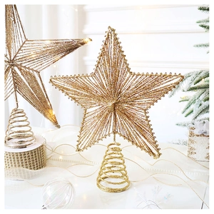 Close-up of champagne gold 3D star tree topper with glitter finish and spiral base