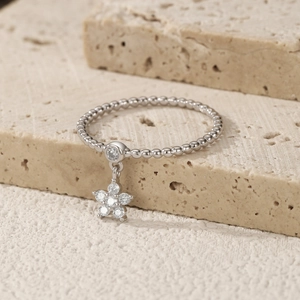 Sparkling S925 sterling silver ring with star flower pendant on a beaded band