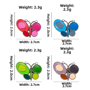 Detailed macro view showing a 2.3g butterfly brooch with size specs 2.0cm by 2.7cm