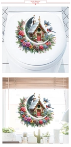 Detailed view of Christmas snow house and bird stickers on a smooth toilet lid surface