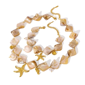 Gold-plated stainless steel jewelry set with starfish pendants and shell beads