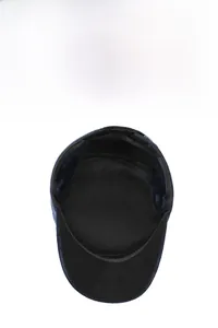 Detailed view of thermal fleece lining inside a navy blue flat top military cap for winter