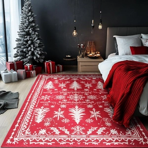 Detail of red faux cashmere Christmas rug with white tree and snowflake patterns