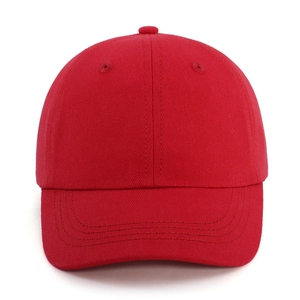 Close-up of a premium red 6-panel cotton twill baseball cap with reinforced stitching