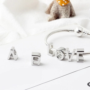 Customizable silver alphabet charm bracelet with LOVE beads and snake chain jewelry