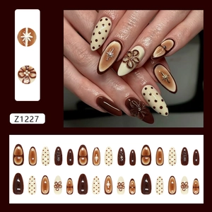 Vintage caramel coffee press-on nails with 3D floral accents and metallic star charms