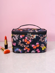 Detail of waterproof makeup bag with butterfly print and double zipper closure