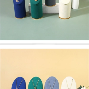 Detail view of luxury velvet jewelry stands for necklaces in various elegant colors
