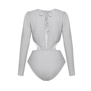 Detail of silver glitter long sleeve swimsuit showing back cutout and tie-up design