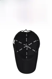 Detail of the inner six-panel structure of this black sport cap with branded seam tape