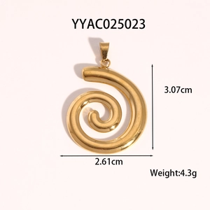 Close-up of golden spiral pendant with dimensions 3.07cm x 2.61cm and weight 4.3g