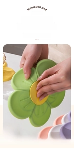 Close-up showing the flexible silicone material and dual-tone cherry blossom design pad