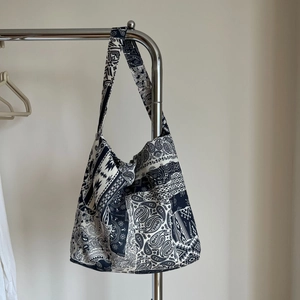 Bohemian paisley print linen shoulder bag with navy and white geometric patterns