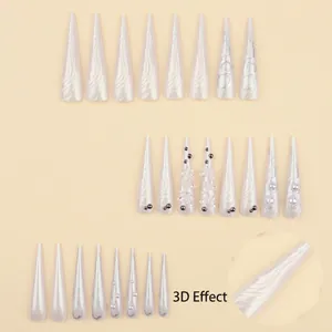 Extra long stiletto press-on nails in pearl white with 3D butterfly and wave textures