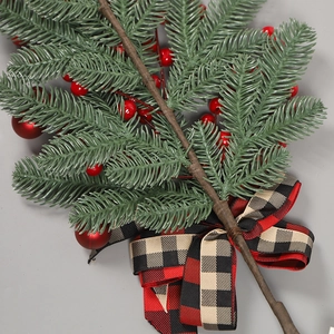 Christmas teardrop swag with green pine needles, red berries, and plaid bow decoration