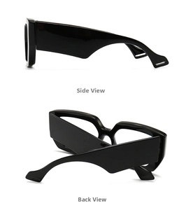 Detail view of bold black oversized eyeglass frames with wide geometric temples