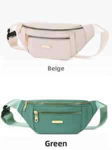 Close-up of stylish PU sports waist bags in beige and green with golden metal zippers
