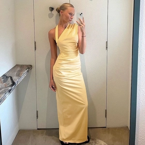 Elegant pale yellow one-shoulder ruched maxi dress with asymmetrical design for women