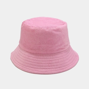 Close-up detail of soft pink terry cloth fabric and stitching on fisherman hat