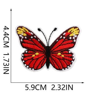 Detail view of red butterfly embroidery patch with dimensions 5.9cm x 4.4cm on white background