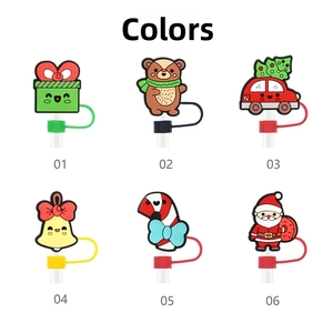 Detail of 6 Christmas silicone straw covers including Santa, tree, and candy cane shapes