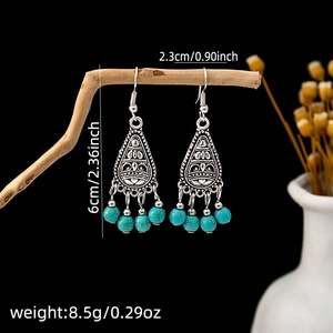 Retro bohemian dangle earrings with blue turquoise beads showing size and weight details