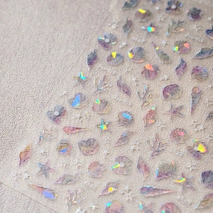 Holographic 3D ocean nail stickers with iridescent starfish and shell designs
