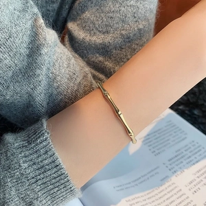 Elegant gold bamboo joint open bracelet with a polished finish for minimalist style
