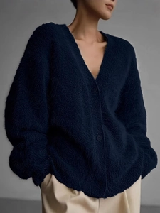 Navy blue V-neck fuzzy knit cardigan sweater with buttons and long sleeves