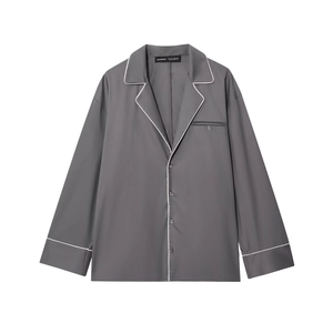 Dark grey long sleeve poplin shirt with white contrast piping and a notch lapel