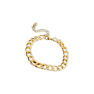 Minimalist gold chain bracelet with flat links and adjustable lobster clasp closure