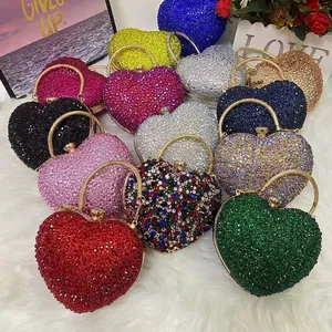 Chic heart-shaped evening clutch bag with sparkling rhinestones and metal handle in various colors