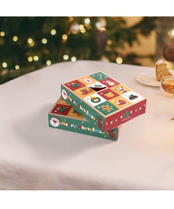 Christmas advent calendar box with festive illustrations on a warm holiday background