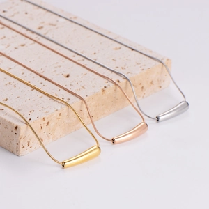 Minimalist stainless steel chili pendant necklace in gold, rose gold and silver finishes