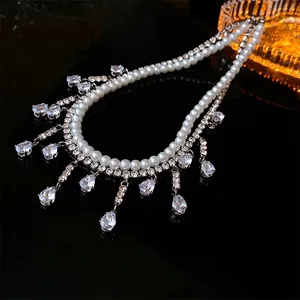 Collier double rang de perles et pompons de zircon avec pendentif goutte d'eau chic