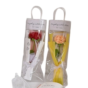 Handmade crochet rose bouquet in transparent gift bags with red and pink yarn flowers