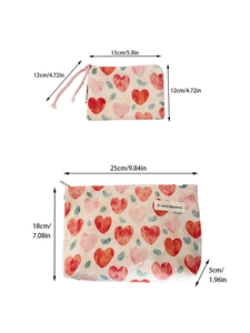 Detailed size chart for heart print canvas makeup bags in small and large sizes