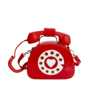 Borsa a tracolla telefono retrò rossa con quadrante a cuore e finitura lucida